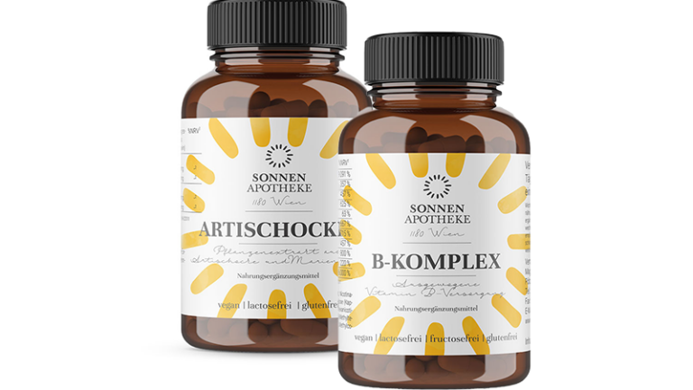Zwei braune Flaschen mit Nahrungsergänzungsmitteln: eine für Artischocke und eine für B-Komplex, beide vegan und glutenfrei.