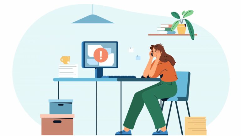 Eine gestresste Frau sitzt an einem Schreibtisch mit einem Computer, der eine Fehlermeldung anzeigt, umgeben von Unterlagen und Pflanzen.